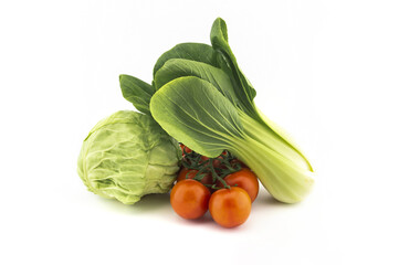 Cabbage, chinese cabbage and cherry tomato twig