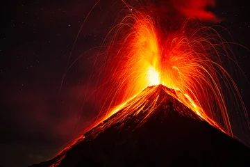 Fotobehang Night eruption of the volcano of fire, Guatemala © Jose