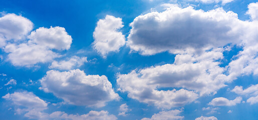 Naklejka na ściany i meble Panorama photo of beautiful white clouds on blue sky