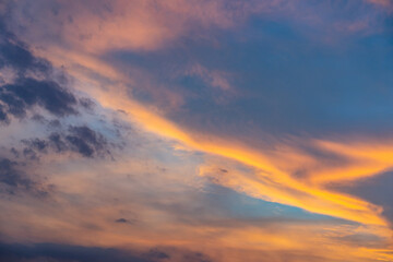 Naklejka na ściany i meble Dramatic twilight sky and clouds at summer sunset