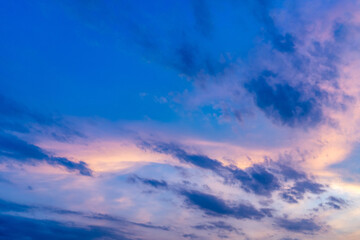 Twilight sky with fluffy cloud in summer evening