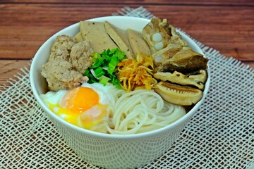 Vietnamese rice noodle soup with pork spare ribs, Vietnamese sausage, mince, minced pork, Shiitake mushrooms and Onsen tamago or soft-boiled/hot spring eggs (Kuey Jab Yuen).