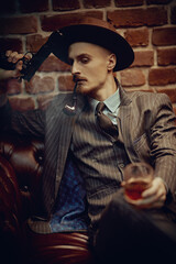 Fototapeta premium confident gangster with gun