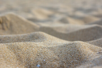 Fototapeta na wymiar Close up beach sand texture. Summer shoot.