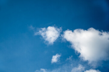 A low angle view of a blue cloudy sky at daytime - perfect for wallpapers and backgrounds