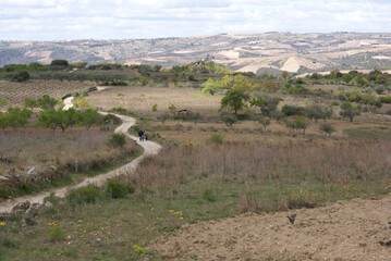 Dirt Empty road zig zag field on the countryside of north of Spain 