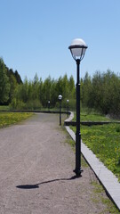 beautiful summer Park paths and lanterns in summer for relaxing and walking with children