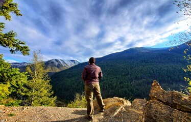 Woman on top of the mountain