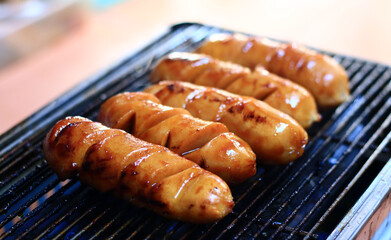 Grilling sausages on the stove. 