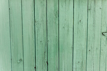 Naklejka premium Wooden vertical striped desk painting mint pastel color. Texture