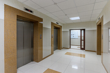 Russia, Moscow- January 27, 2020: interior public place, house entrance. doors, walls, corridors staircase