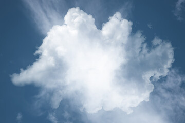 white fluffy clouds in the blue sky .blue sky background with tiny clouds