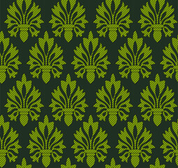 Seamless ikat geometrical motif pattern with background seamless damask pattern with green leaves