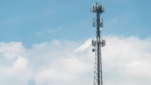 5G Cell Phone Tower Time Lapse With Low Clouds Day