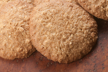 Oatmeal cakes on a wooden board