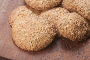 Oatmeal cakes on a wooden board