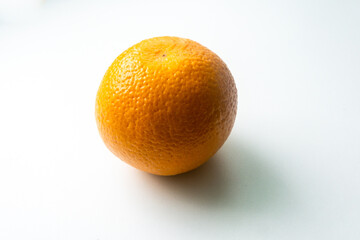 orange fruit isolated on a white table. view from above