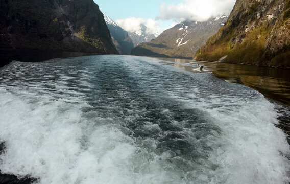 Fjord and a backtrace of a boat