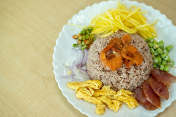 Thai food menu today is Mixed Cooked Rice with Shrimp Paste Sauce.