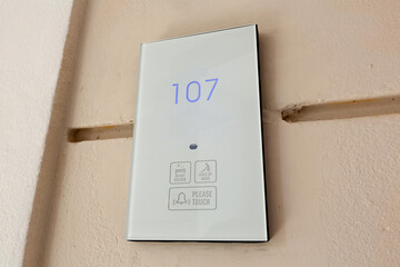 Wall mounted electronic hotel room number