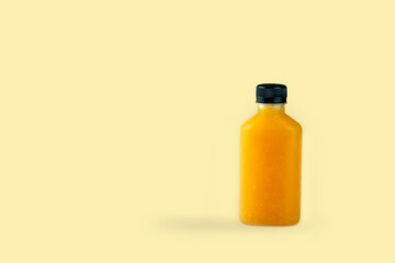Natural pure orange juice packed in plastic bottles