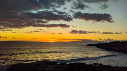Beautiful sunny sunset over the ocean and coast.
