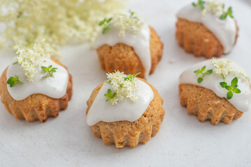 home made elderflower lemon cupcakes on a table