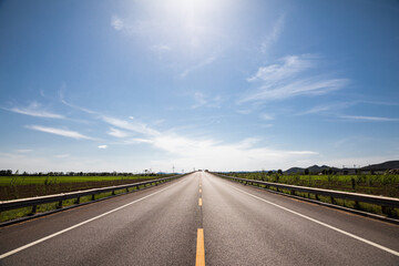 Picturesque country road and clear sky - 354831640
