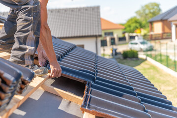 production of roofs from ceramic fired tiles on a family house