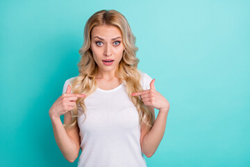 Portrait of astonished fear panic woman hear her select work job point index finger herself wear good look outfit isolated over teal color background