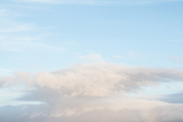 Beautiful clouds on the blue sky. Blue sky with clouds background with soft focus. Spring backgorund. Spring`s background.