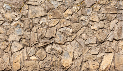 Patterned stone texture. The exterior facade of the building.