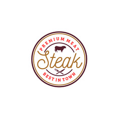 Vector illustration of stamp shaped logo with simple typography, cow, fork and knife isolated on white background perfect for restaurant logo template