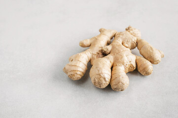Fresh ginger root on a white background. The Active Ingredient in Ginger Can Help Fight Infections and Viruses.