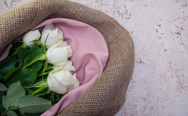 Top view of white roses bouquet.
