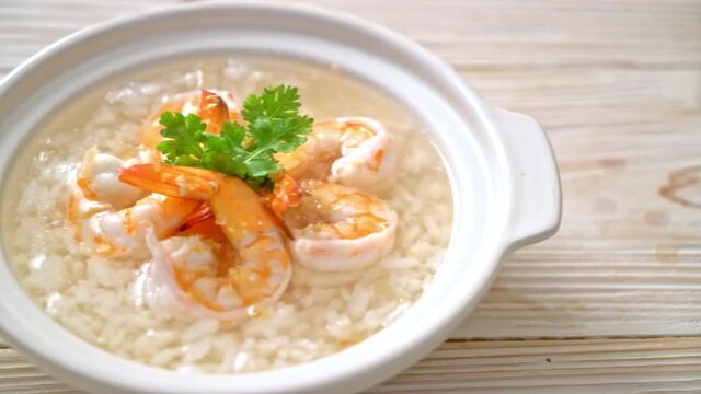 porridge or boiled rice soup with shrimps bowl