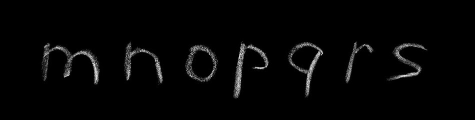 English letters hand written in chalk on a blackboard  isolated on a black background. Lowercase...