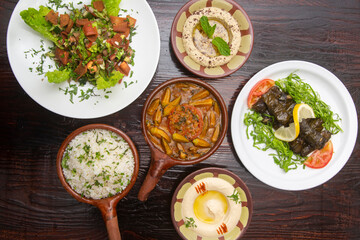 Table with typical Lebanese food dishes, warak enab, ocra