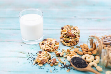 Multigrain Cookies and vegetarian ingredient with milk on blue wooden table