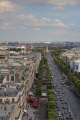 Beautiful, dark, calm photo of Paris avenues and boulevards taken at sunset from the Arc de Triomphe