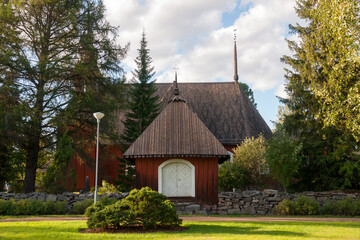 Pihlajаvesi (Petäjävesi) Old Church.  Church is listed as UNESCO World Heritage Site.   Pihlajаvesi (Petäjävesi) is municipality of Finland 