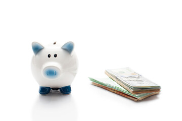 ceramic piggy bank and money