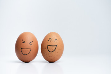 egg with a smile on white background