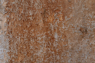 Wall with the texture of old stucco. Orange rough stucco.
