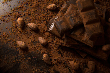 Almond dark Chocolate Cocoa on black background close-up