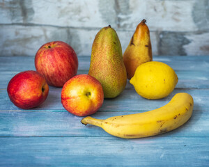 Large fruit set of fresh apples, nectarine, lemon and banana