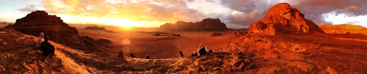 Fototapeta na wymiar Sunset Panoramic photo view in the desert of Wdai Rum, Jordan. 