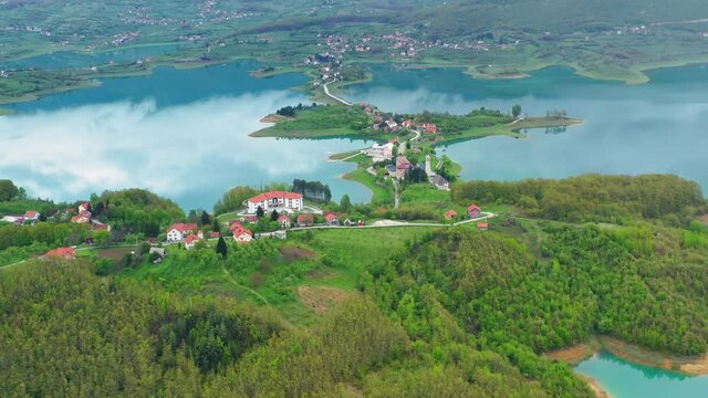 Rama Lake or Ramsko Jezero and lush greenery nature. Aerial wide shot