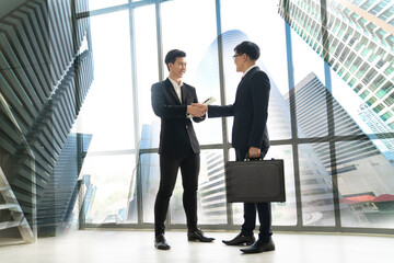 Businesspeople shaking hands in the office finishing the successful meeting, concept teamwork coordination