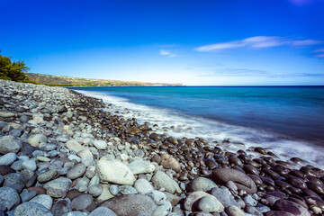 Basalt rock beach in the bay of Saint-Paul eroded by the sea - Reunion island